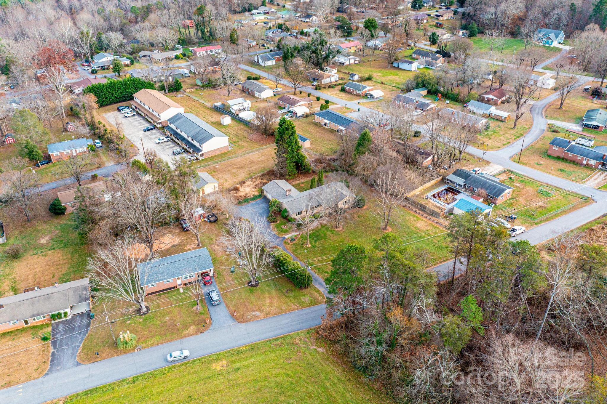 325 Sheldon Street Hudson, NC 28638 - Photo 28 of 33 an aerial view of residential houses with outdoor space