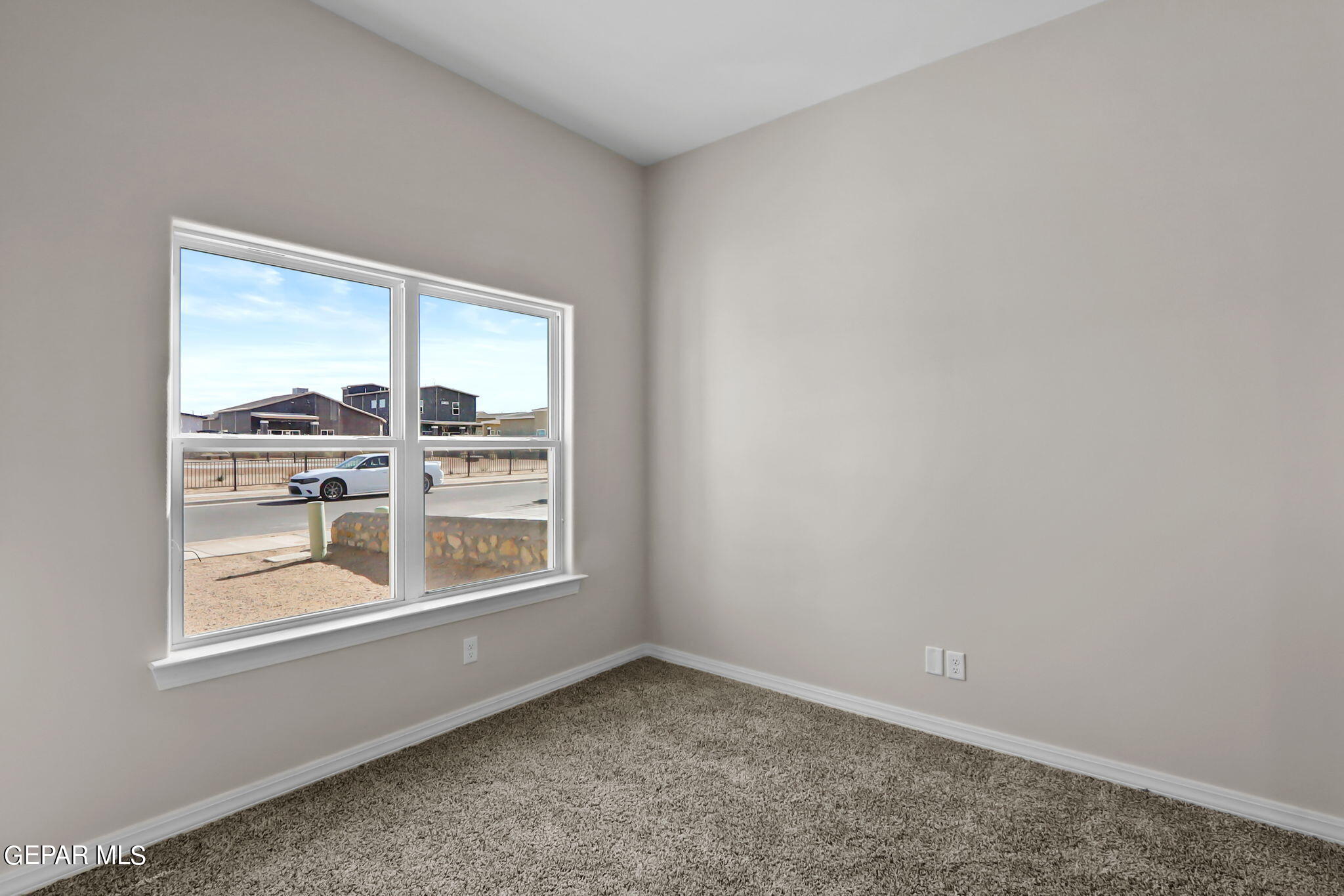 6064 Summer Ridge Sunland Park, NM 88008 - Photo 3 of 30 an empty room with a window