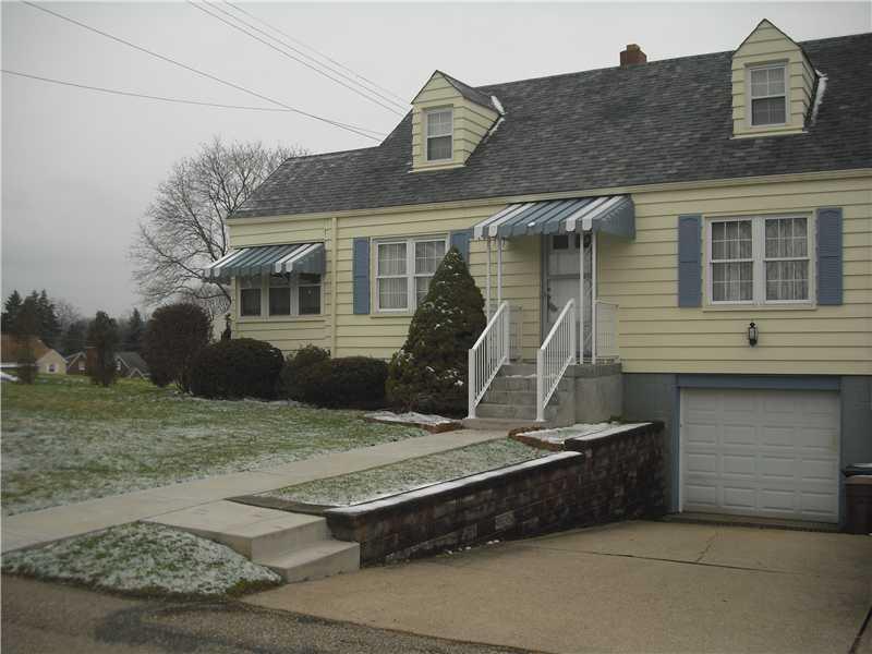 Exterior Front. Front of Home!  It is MUCH bigger then it looks! Work in the City, Shop in the Suburbs!  Newer Siding, Newer Awnings, Newer Front Porch, Newer Railings, Newer Roof! Roof was put on in 2011! Fantastic Curb Appeal!!