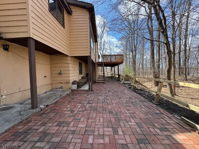 a view of a back yard of the house