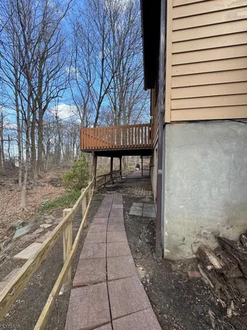 a view of a patio with a yard