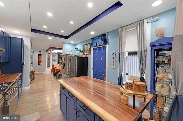 a view of a living room and entry way