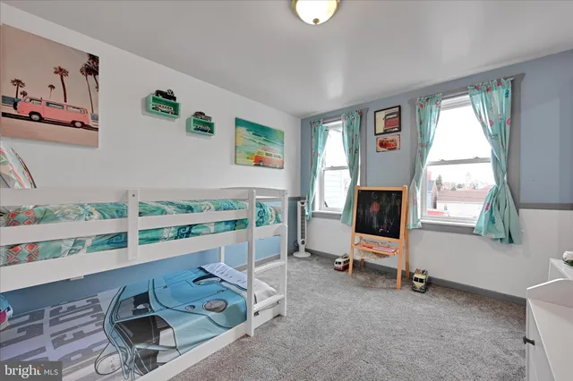 a utility room with sink dryer and washer