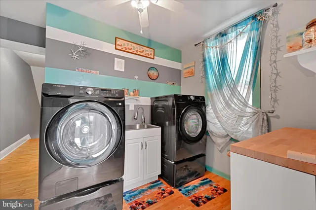 a view of a chairs and table in the balcony
