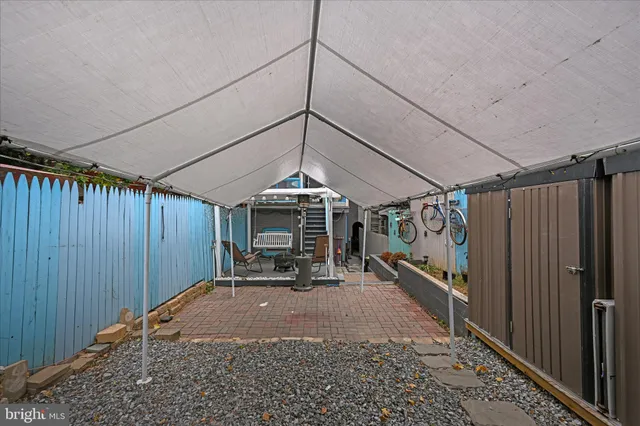 a view of a car park in front of house