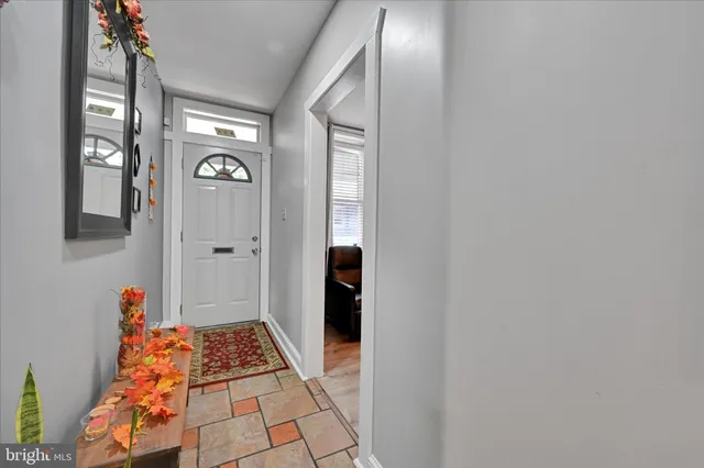 a view of room with window and hardwood floor