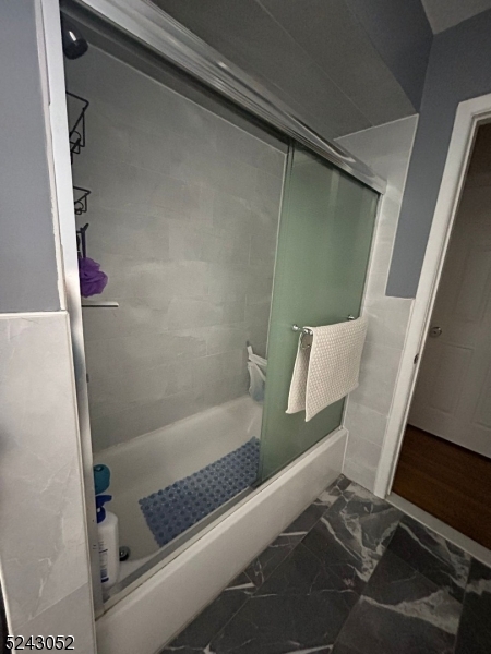 85 Eastern Way, Unit 2 Rutherford, NJ 07070 - Photo 13 of 14 a bathroom with a bathtub