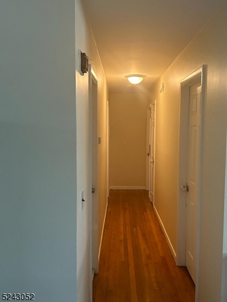 85 Eastern Way, Unit 2 Rutherford, NJ 07070 - Photo 7 of 14 a view of hallway with shower