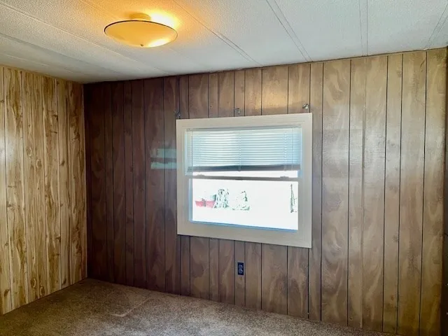 an outdoor view with wooden door