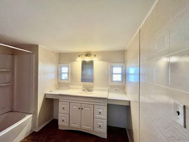 56 Contessa Lane Springfield, MA 01119 - Photo 14 of 25 a bathroom with a double vanity sink and mirror with shower