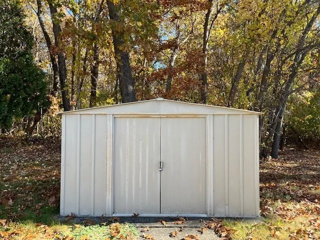 a view of a wooden fence