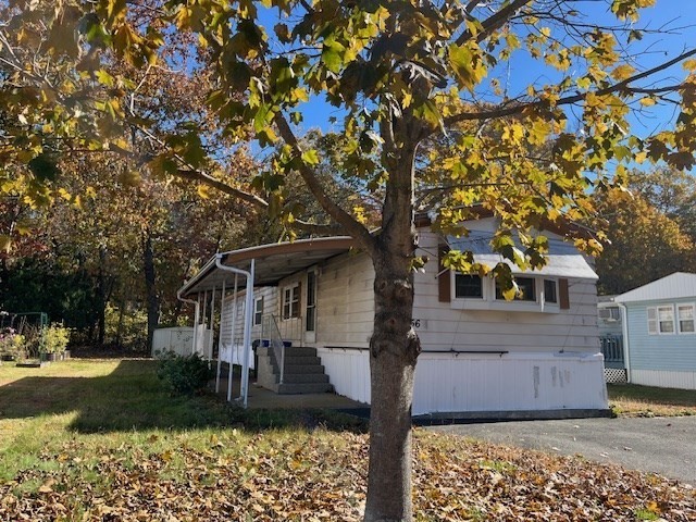 56 Contessa Lane Springfield, MA 01119 - Photo 20 of 25 a front view of a house with garden