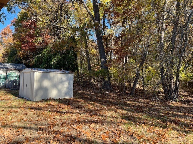 56 Contessa Lane Springfield, MA 01119 - Photo 21 of 25 a view of outdoor space with large trees
