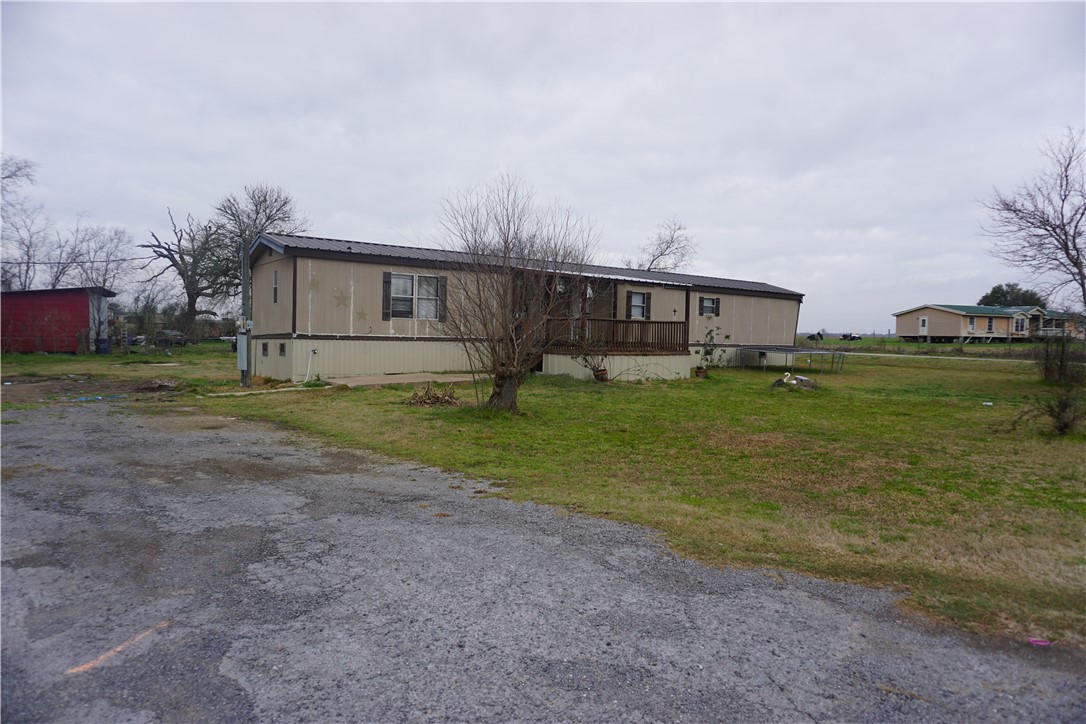 5765 Post Oak Loop Midway, TX 75852 - Photo 2 of 11 a view of a house with a yard