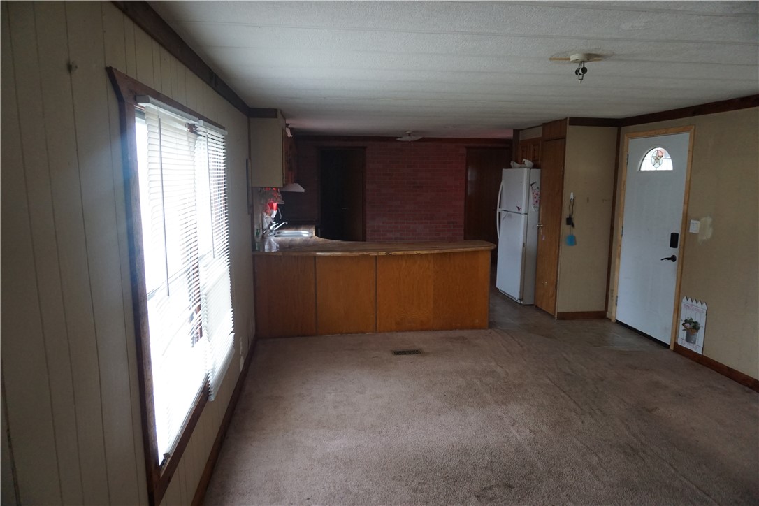 5765 Post Oak Loop Midway, TX 75852 - Photo 6 of 11 an empty room with windows