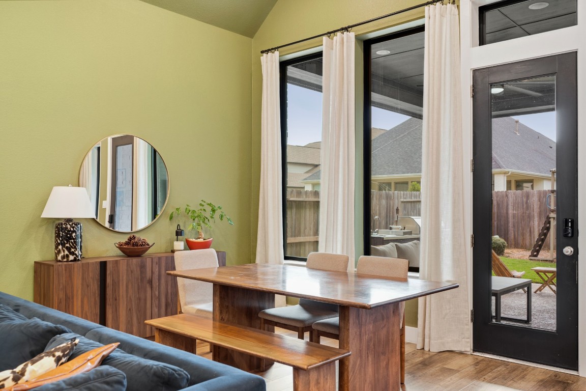 8902 Iron Forge Road Missouri City, TX 77459 - Photo 15 of 44 a living room with furniture a window and potted plants