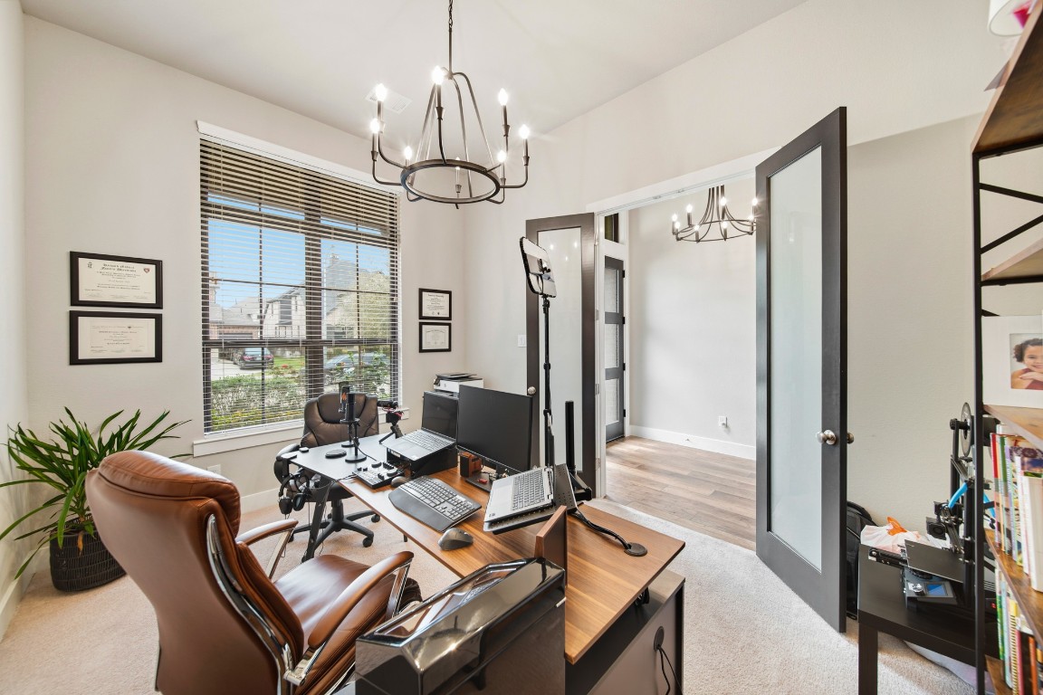 8902 Iron Forge Road Missouri City, TX 77459 - Photo 19 of 44 a view of a livingroom with furniture window and wooden floor