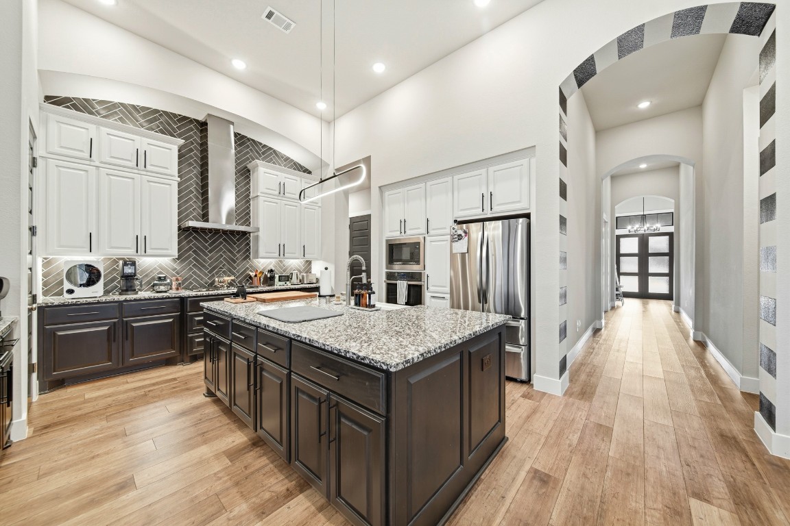 8902 Iron Forge Road Missouri City, TX 77459 - Photo 4 of 44 Granite countertop island with plenty of storage.