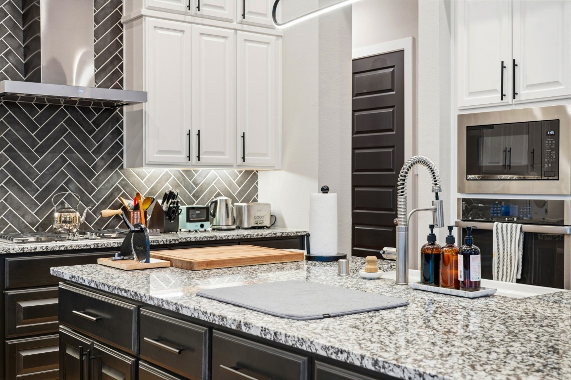 8902 Iron Forge Road Missouri City, TX 77459 - Photo 5 of 44 a kitchen with sink and window