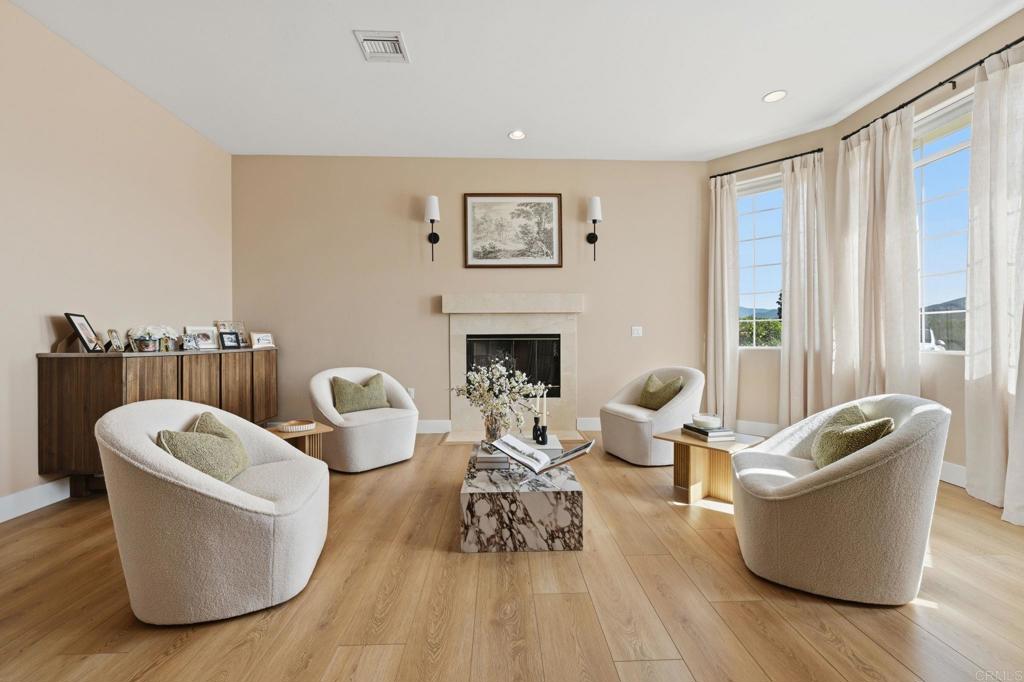 2852 Conestoga Court Alpine, CA 91901 - Photo 12 of 65 a living room with furniture and a fireplace