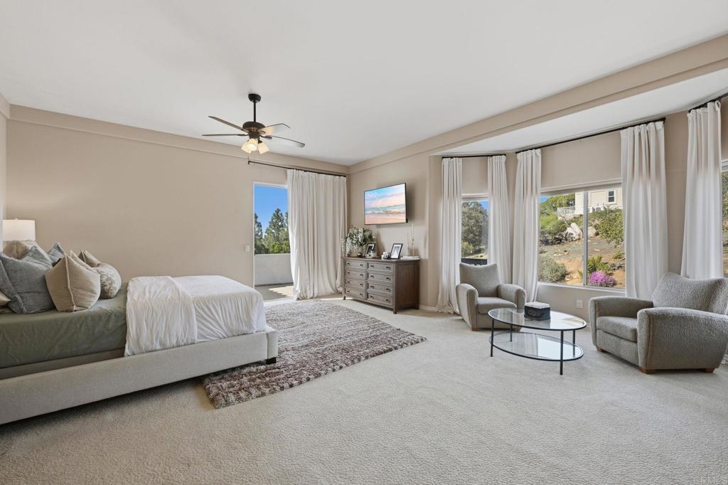 2852 Conestoga Court Alpine, CA 91901 - Photo 28 of 65 a living room with furniture and a large window