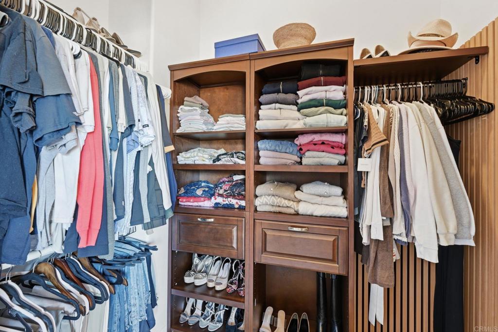 2852 Conestoga Court Alpine, CA 91901 - Photo 32 of 65 a view of walk in closet with clothes and shoes
