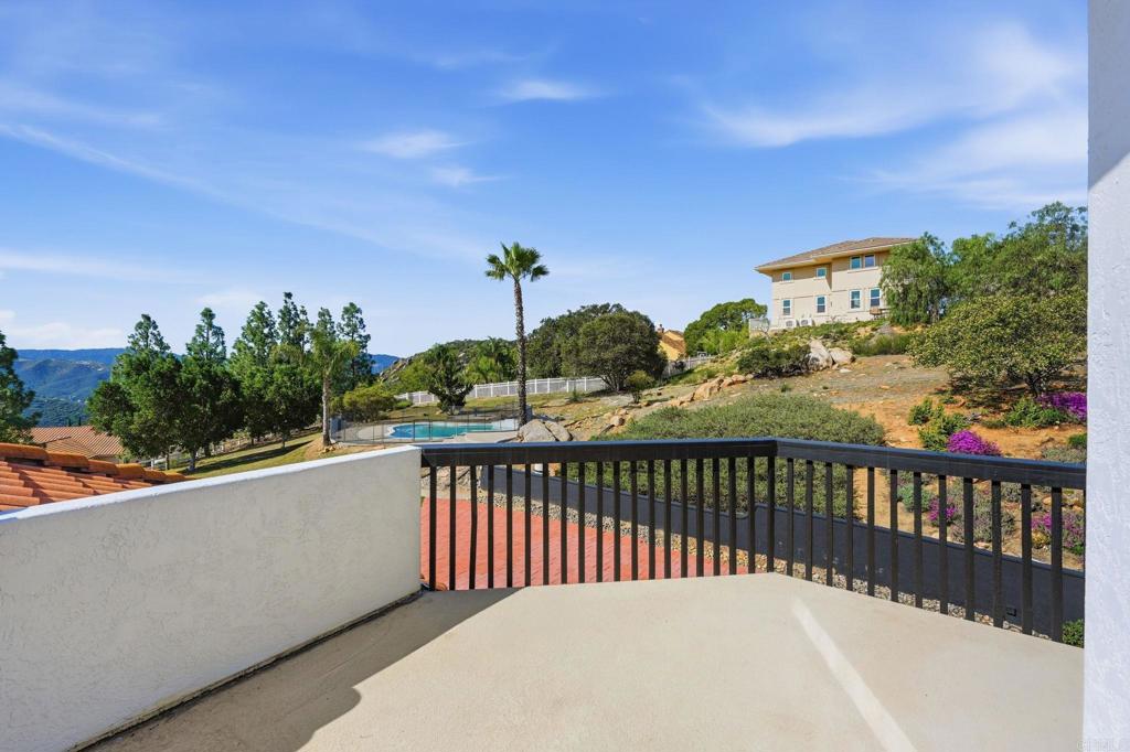 2852 Conestoga Court Alpine, CA 91901 - Photo 35 of 65 a view of a balcony with wooden fence