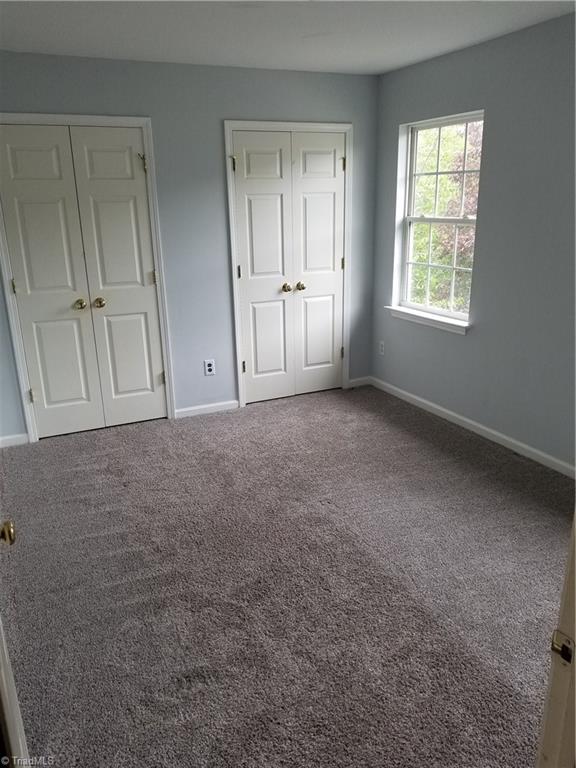 315 Apple Ridge Road Greensboro, NC 27406 - Photo 21 of 22 Bedroom 2 w/Huge walk-in closet