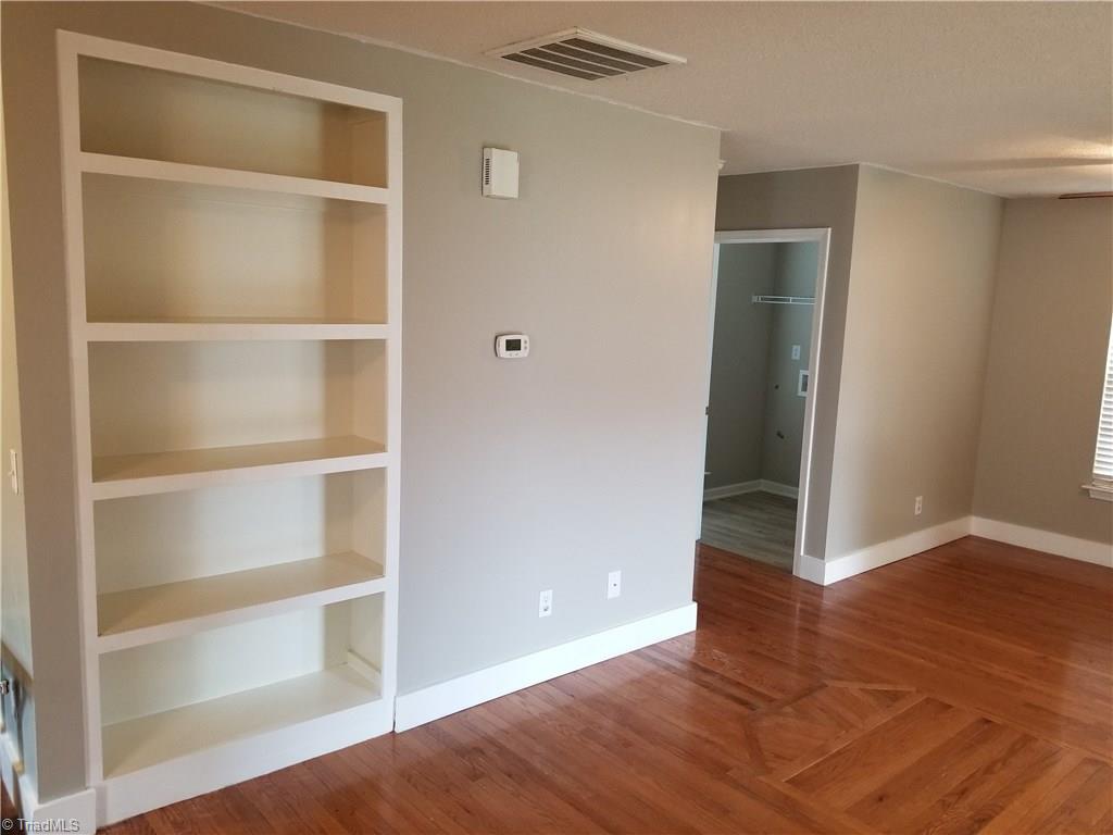 315 Apple Ridge Road Greensboro, NC 27406 - Photo 8 of 22 Built In Book Shelf. Hardwoods throughout