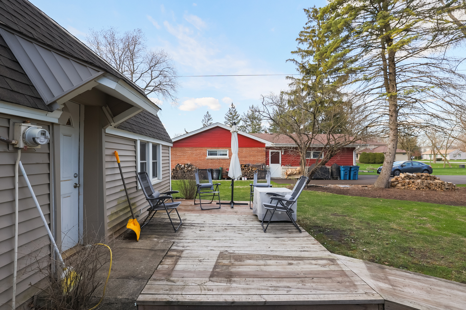 5938 Dunham Road Downers Grove, IL 60516 - Photo 11 of 11 a view of a house with backyard porch and sitting area