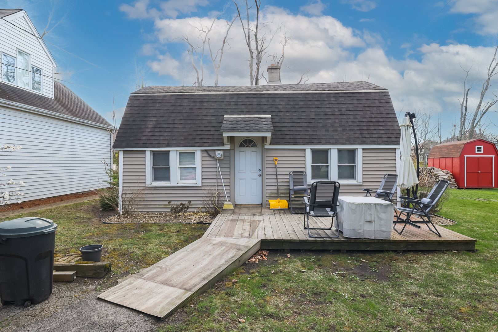 5938 Dunham Road Downers Grove, IL 60516 - Photo 8 of 11 front view of a house with a patio