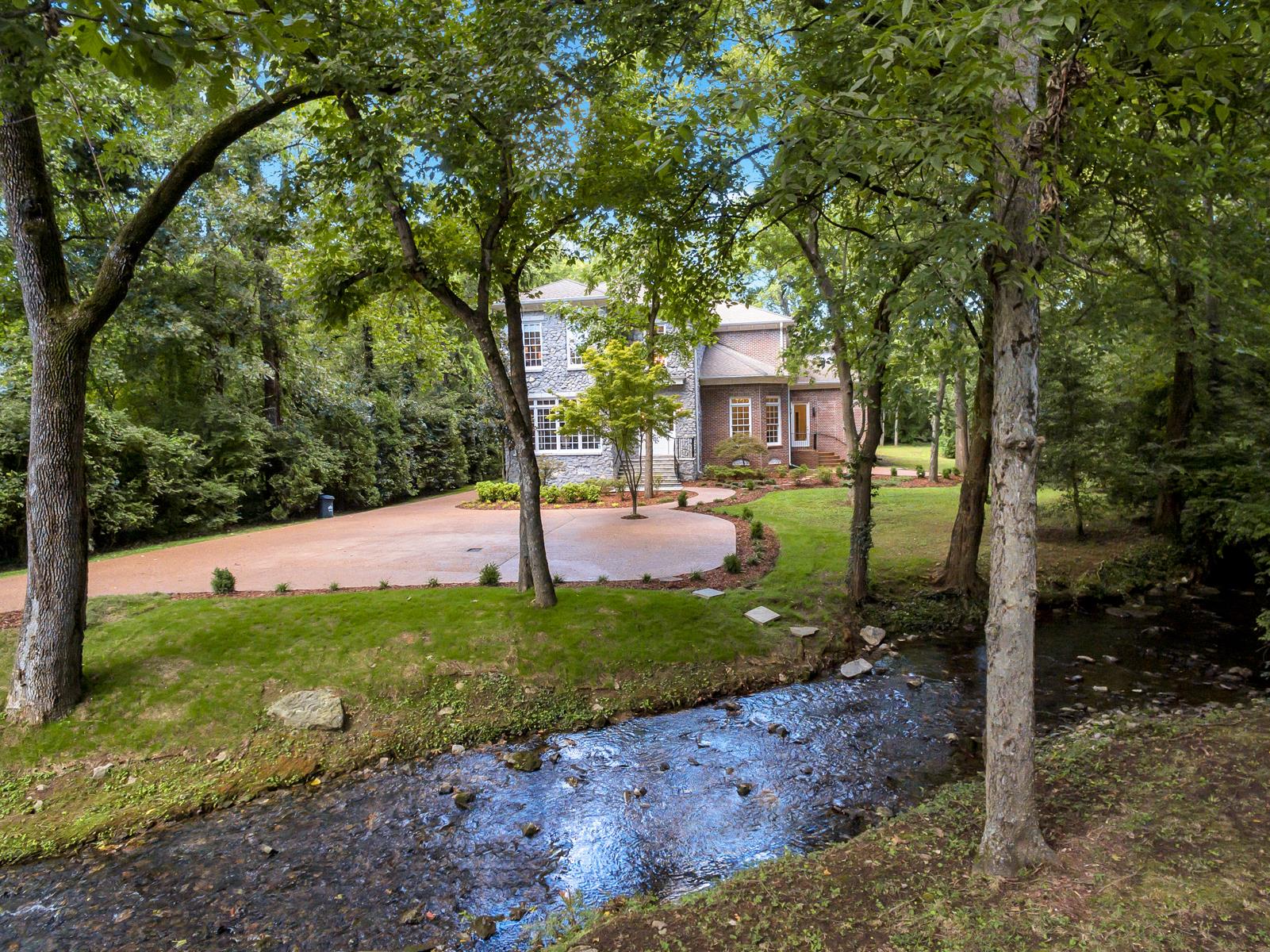 4006 Harding Place Nashville, TN 37215 - Photo 1 of 30 a view of a house with a yard