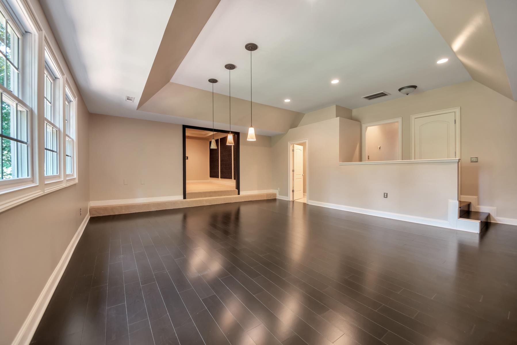 4006 Harding Place Nashville, TN 37215 - Photo 22 of 30 a view of an empty room with wooden floor and a window