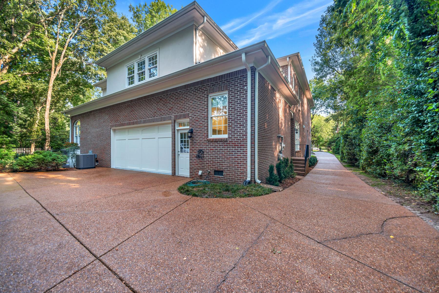 4006 Harding Place Nashville, TN 37215 - Photo 29 of 30 a front view of a house with garden