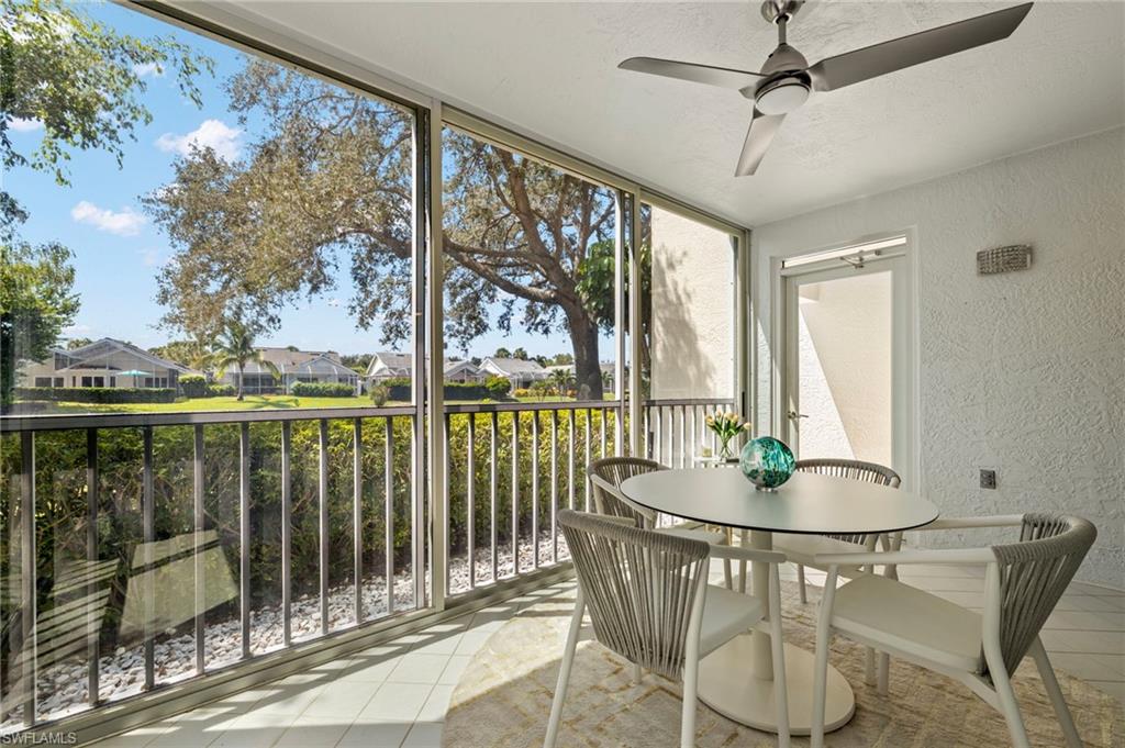 793 Willowbrook Drive, Unit 104 Naples, FL 34108 - Photo 15 of 38 a dining room with furniture window and outside view