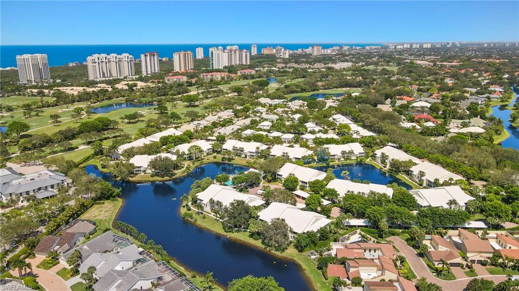 793 Willowbrook Drive, Unit 104 Naples, FL 34108 - Photo 8 of 38 a view of outdoor space and city view