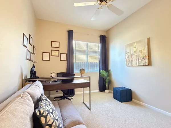 a bedroom with a bed and a view of bathroom