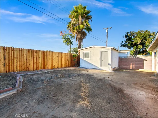 a potted plant sitting in front of a house