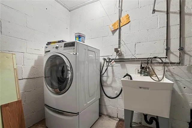 a utility room with dryer and washer
