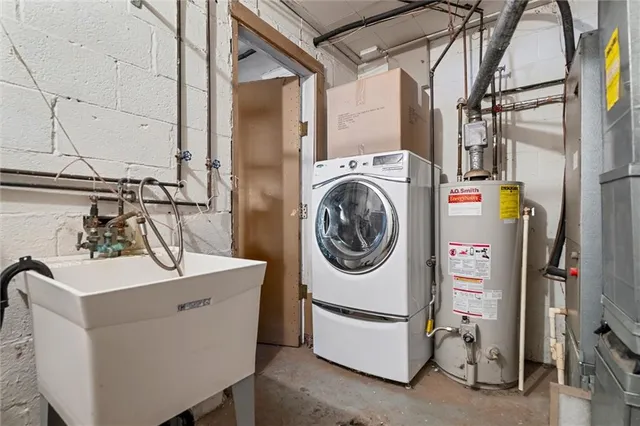 a utility room with dryer and washer