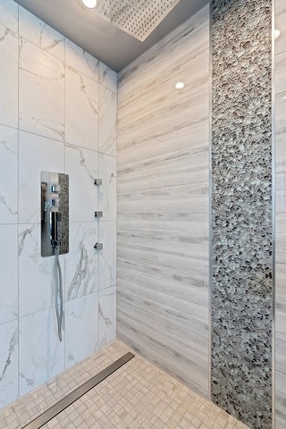 1708 West Cermak Road, Unit 2E Chicago, IL 60608 - Photo 36 of 49 a bathroom with a shower