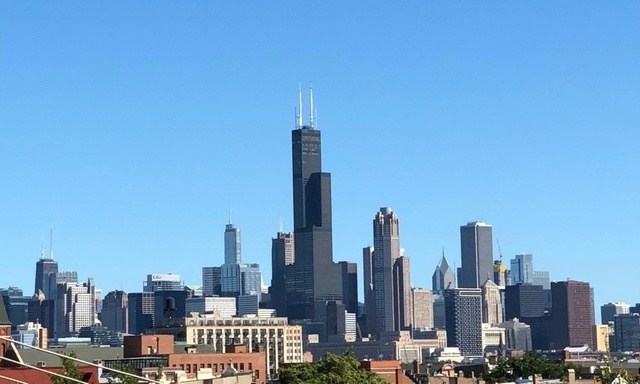 1708 West Cermak Road, Unit 2E Chicago, IL 60608 - Photo 49 of 49 a view of a city with tall buildings