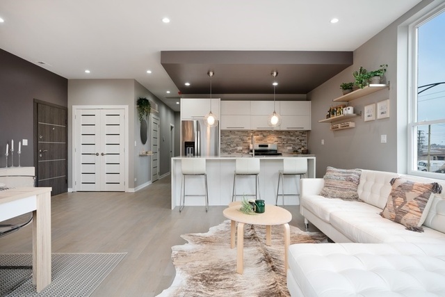 1708 West Cermak Road, Unit 2E Chicago, IL 60608 - Photo 6 of 49 a living room with furniture and kitchen view