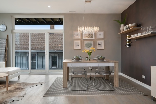1708 West Cermak Road, Unit 2E Chicago, IL 60608 - Photo 9 of 49 a dining room with furniture and window
