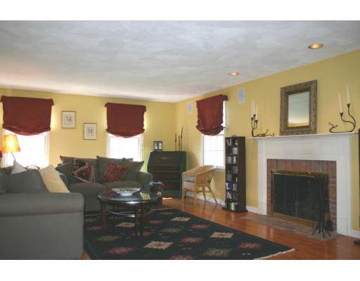 16 Michael Road Wayland, MA 01778 - Photo 5 of 9 a living room with furniture and a fireplace