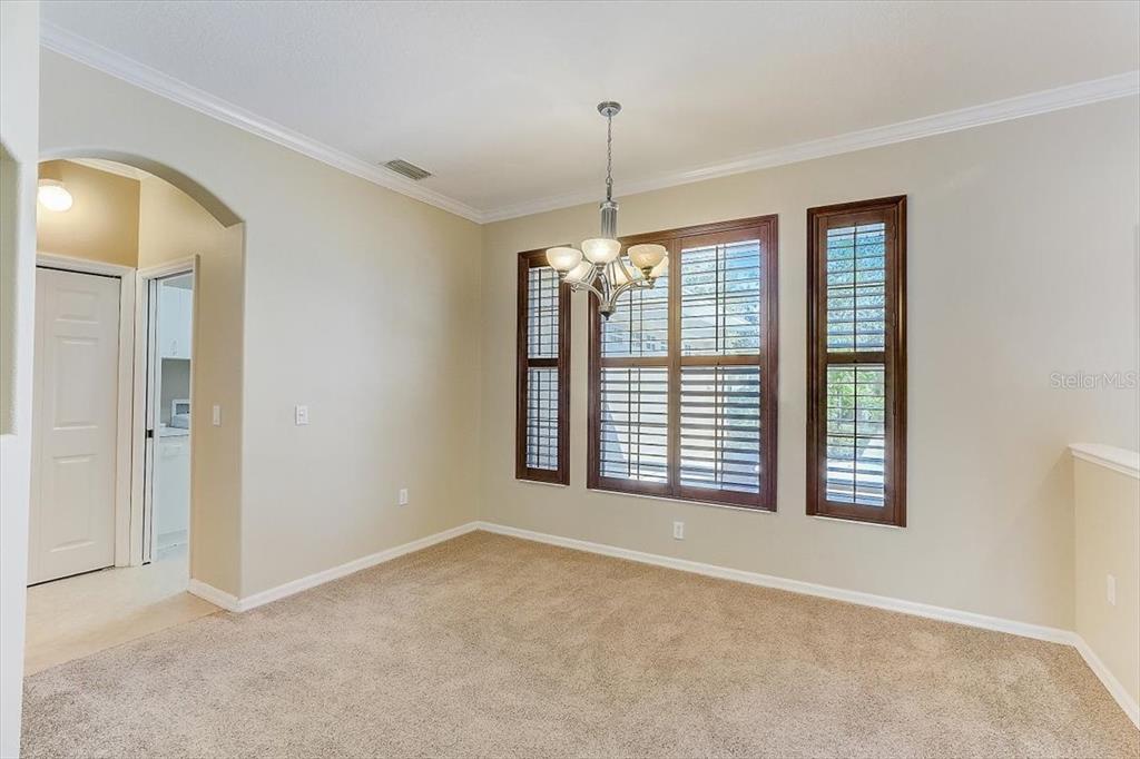6214 Warbler Lane Lakewood Ranch, FL 34202 - Photo 14 of 40 a view of an empty room with a window