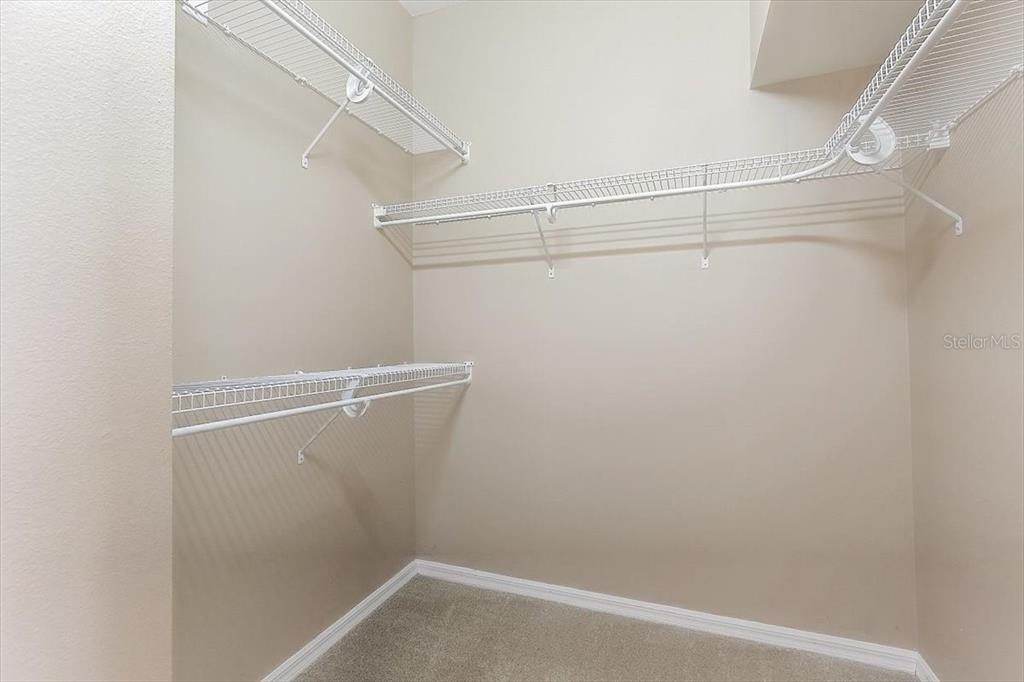 6214 Warbler Lane Lakewood Ranch, FL 34202 - Photo 21 of 40 a view of a room with racks on the wall