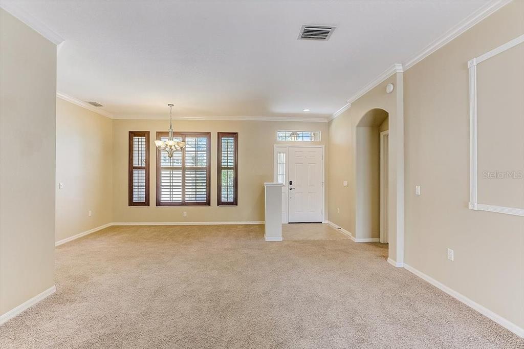 6214 Warbler Lane Lakewood Ranch, FL 34202 - Photo 4 of 40 a view of an empty room with a window