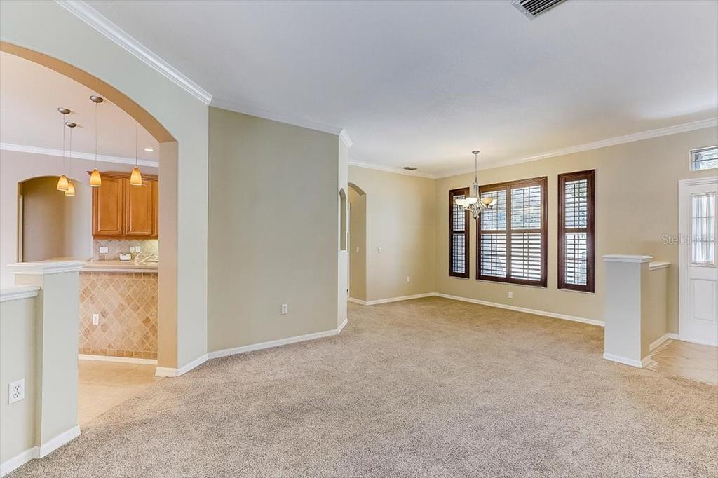 6214 Warbler Lane Lakewood Ranch, FL 34202 - Photo 6 of 40 a view of an empty room with a window