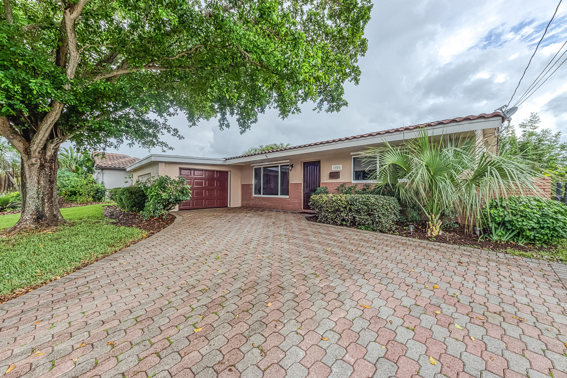 1055 Southwest 11th Street Boca Raton, FL 33486 - Photo 1 of 26 Waterfront 1 car garage